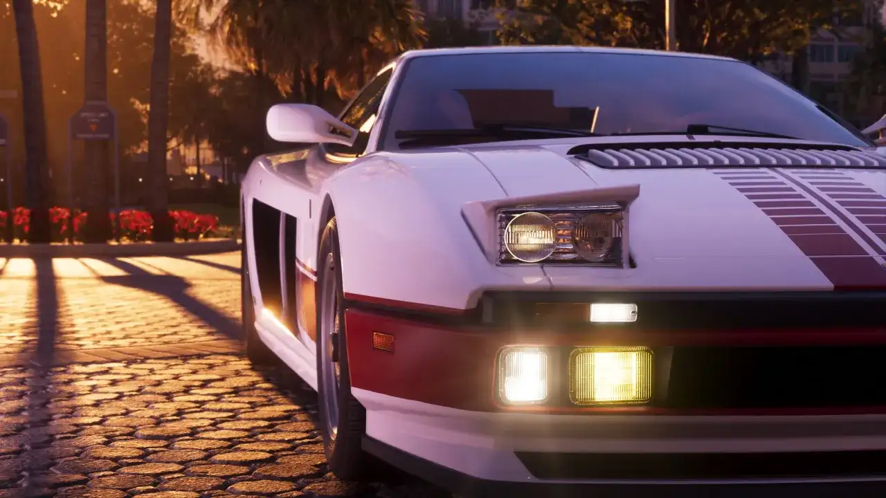 Biały sportowy samochód z czerwonymi pasami na masce, gotowy do jazdy w GTA 6.
